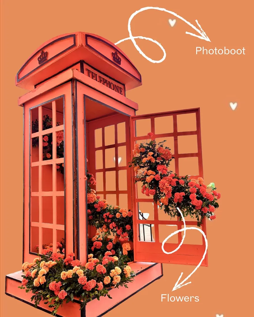 Vintage rose-covered phone booth photobooth